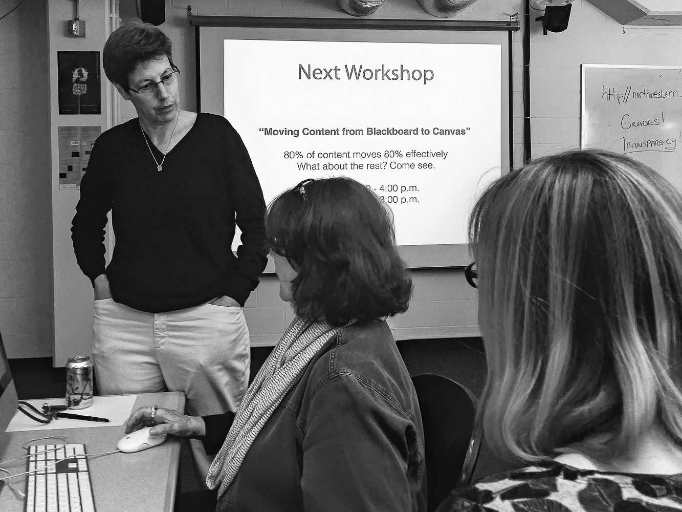A blast from the past… the “old” MMLC lab in Kresge Hall with a co-led MMLC - NUIT workshop on migrating content to Canvas…  Vicki Getis from NUIT talks with Penny Fahey (middle) as Katrin Volkner listens.